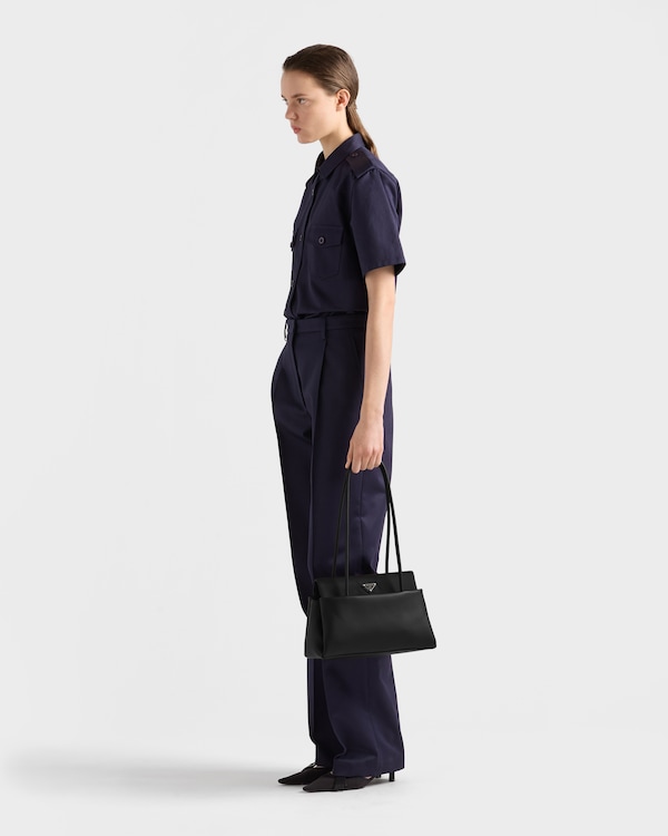 Prada Passage medium leather bag with Re-Nylon flap - Black Prada Passage medium leather bag with Re-Nylon flap - Black