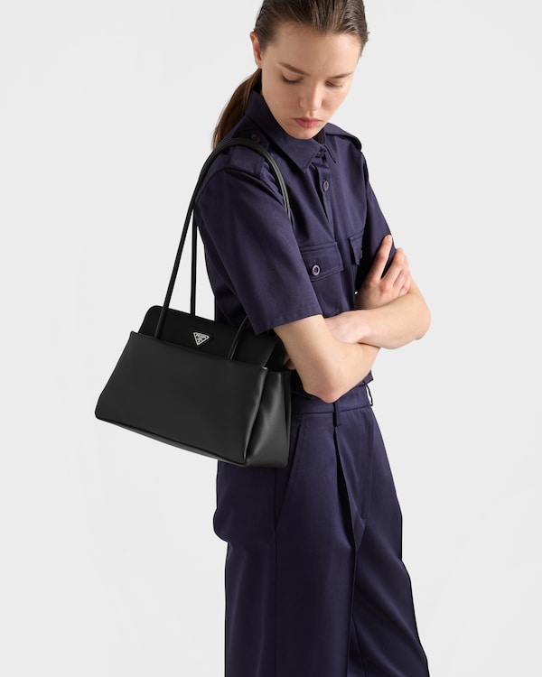 Prada Passage medium leather bag with Re-Nylon flap - Black Prada Passage medium leather bag with Re-Nylon flap - Black
