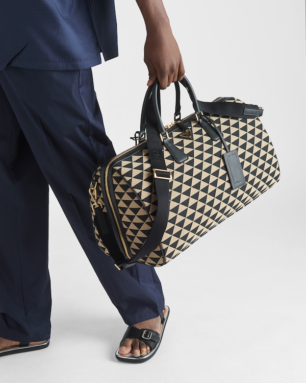 Large Prada Symbole embroidered fabric travel bag - Black/Beige Large Prada Symbole embroidered fabric travel bag - Black/Beige