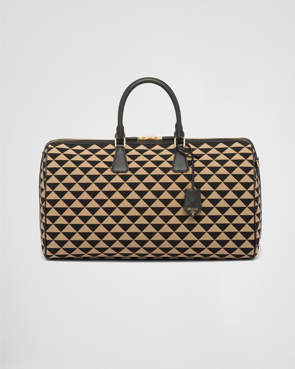 Large Prada Symbole embroidered fabric travel bag - Black/Beige Large Prada Symbole embroidered fabric travel bag - Black/Beige