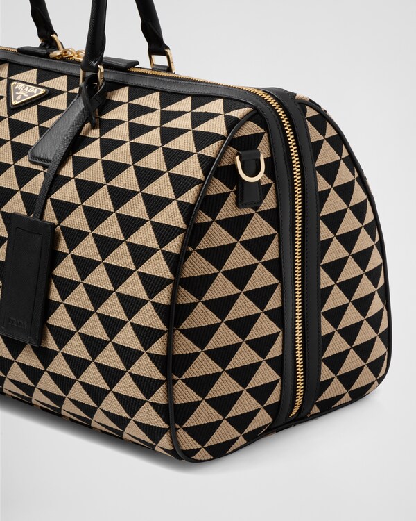 Large Prada Symbole embroidered fabric travel bag - Black/Beige Large Prada Symbole embroidered fabric travel bag - Black/Beige