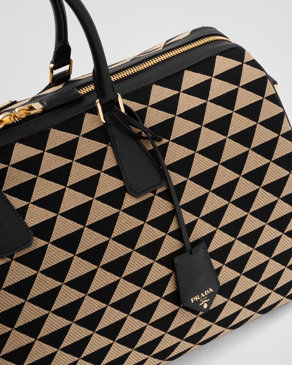 Large Prada Symbole embroidered fabric travel bag - Black/Beige Large Prada Symbole embroidered fabric travel bag - Black/Beige