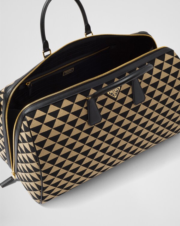 Large Prada Symbole embroidered fabric travel bag - Black/Beige Large Prada Symbole embroidered fabric travel bag - Black/Beige