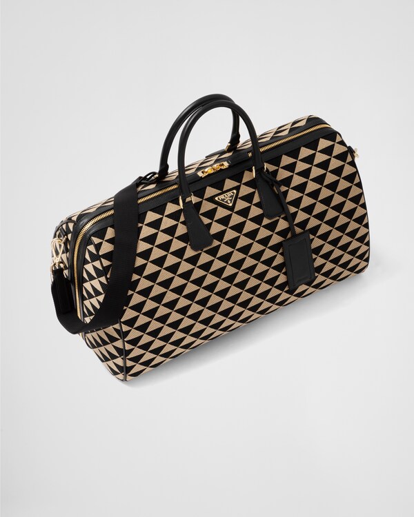 Large Prada Symbole embroidered fabric travel bag - Black/Beige Large Prada Symbole embroidered fabric travel bag - Black/Beige