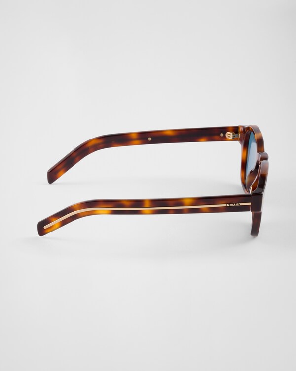 Sunglasses with the iconic metal plaque - Turquoise Lenses Sunglasses with the iconic metal plaque - Turquoise Lenses