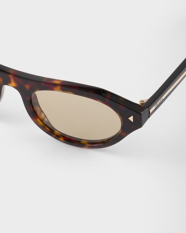 Prada sunglasses with the iconic metal plaque - Chamomile yellow lenses Prada sunglasses with the iconic metal plaque - Chamomile yellow lenses