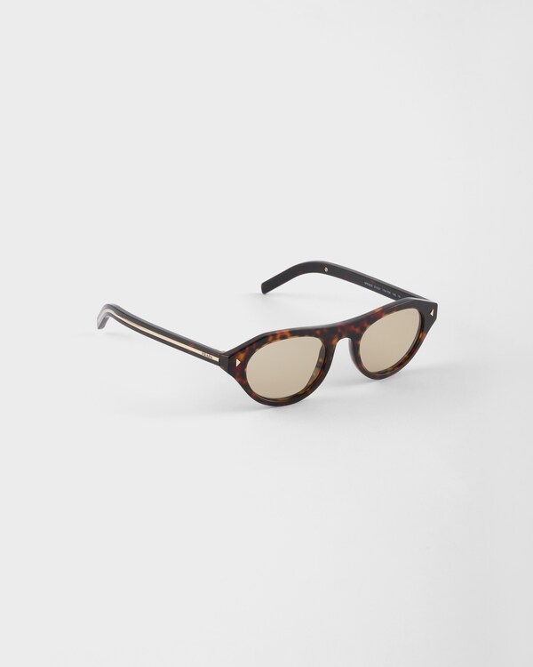 Prada sunglasses with the iconic metal plaque - Chamomile yellow lenses Prada sunglasses with the iconic metal plaque - Chamomile yellow lenses