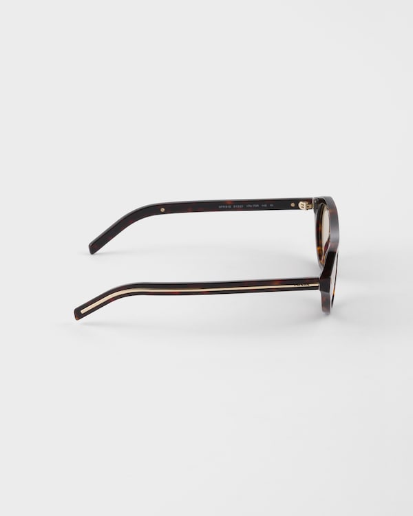 Prada sunglasses with the iconic metal plaque - Chamomile yellow lenses Prada sunglasses with the iconic metal plaque - Chamomile yellow lenses
