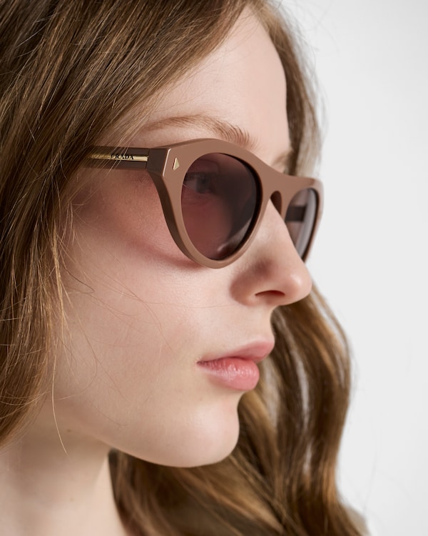 Prada sunglasses with the iconic metal plaque - Mud Brown lenses Prada sunglasses with the iconic metal plaque - Mud Brown lenses