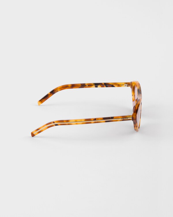Prada sunglasses with the iconic metal plaque - Fuchsia lenses Prada sunglasses with the iconic metal plaque - Fuchsia lenses