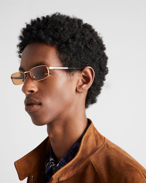 Sunglasses with the iconic metal plaque - Honey lenses Sunglasses with the iconic metal plaque - Honey lenses