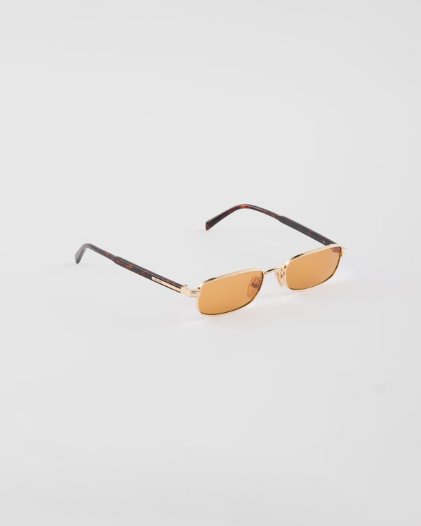 Sunglasses with the iconic metal plaque - Honey lenses Sunglasses with the iconic metal plaque - Honey lenses