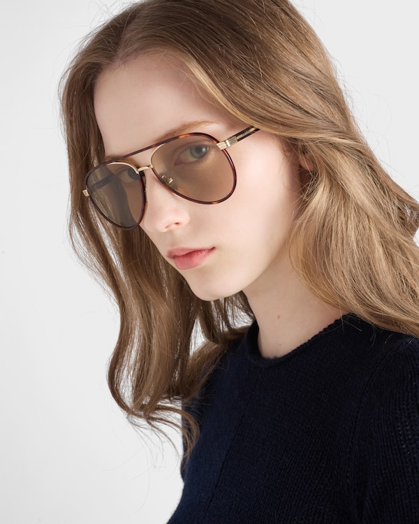 Prada sunglasses with the iconic metal plaque - Camomile Lenses Prada sunglasses with the iconic metal plaque - Camomile Lenses