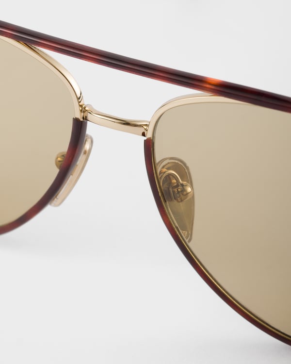 Prada sunglasses with the iconic metal plaque - Camomile Lenses Prada sunglasses with the iconic metal plaque - Camomile Lenses