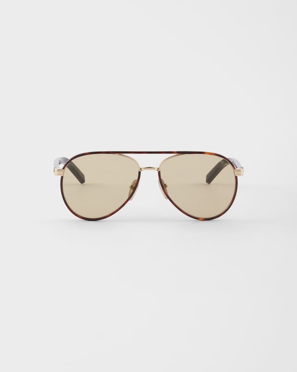 Prada sunglasses with the iconic metal plaque - Camomile Lenses Prada sunglasses with the iconic metal plaque - Camomile Lenses