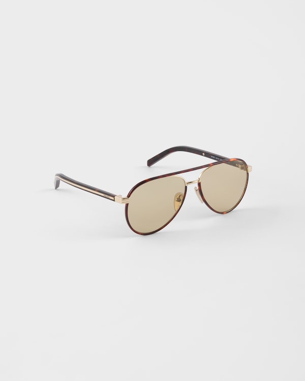 Prada sunglasses with the iconic metal plaque - Camomile Lenses Prada sunglasses with the iconic metal plaque - Camomile Lenses