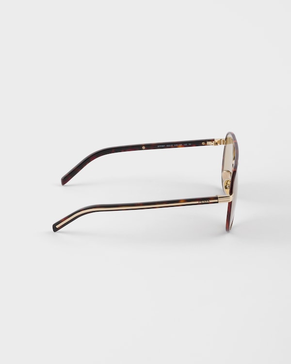 Prada sunglasses with the iconic metal plaque - Camomile Lenses Prada sunglasses with the iconic metal plaque - Camomile Lenses