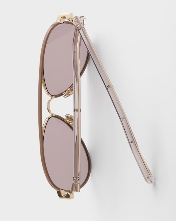 Prada sunglasses with the iconic metal plaque - MAUVE LENSES Prada sunglasses with the iconic metal plaque - MAUVE LENSES