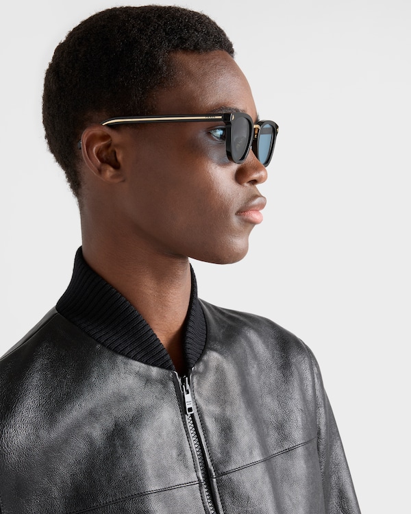 Sunglasses with the iconic metal plaque - Turquoise Lenses Sunglasses with the iconic metal plaque - Turquoise Lenses