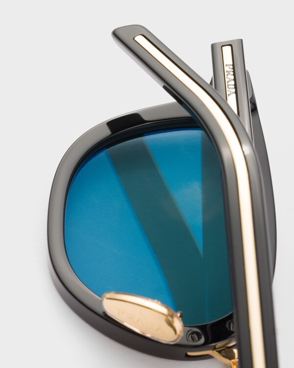 Sunglasses with the iconic metal plaque - Turquoise Lenses Sunglasses with the iconic metal plaque - Turquoise Lenses