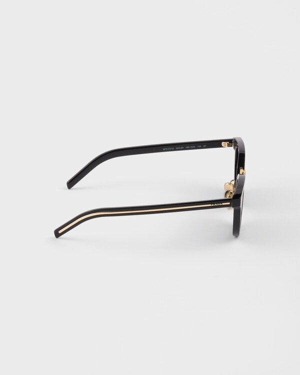 Sunglasses with the iconic metal plaque - Turquoise Lenses Sunglasses with the iconic metal plaque - Turquoise Lenses