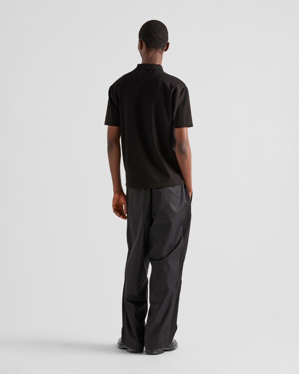 Piqué polo shirt with Re-Nylon details - Black Piqué polo shirt with Re-Nylon details - Black