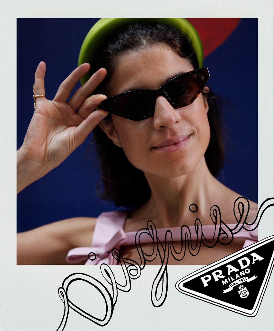Leandra Medine wearing the new Prada Disguise eyewear collection